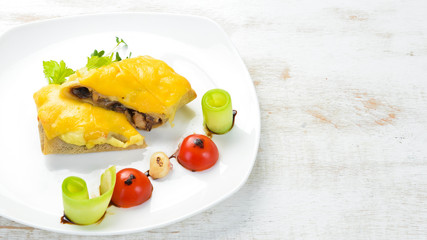 Pancakes with mushrooms and cheese. Top view. Free space for your text.