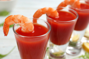 Delicious shrimp cocktail with tomato sauce, closeup