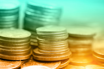 Rows of coins for finance and background saving concept, Gold and green color
