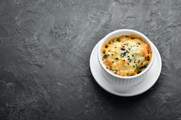 Chicken fillet with mushrooms and cheese. Julien. Top view. Free copy space.