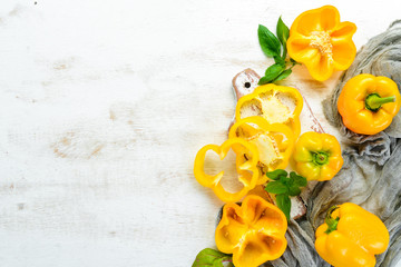 Sweet yellow bell pepper. Fresh vegetables. Top view. Free space for your text.