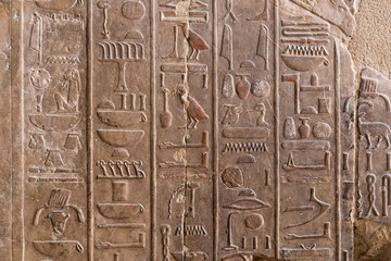 Karnak Temple, Temple Ruins, Embossed hieroglyphics on columns. Great Hypostyle Hall.	