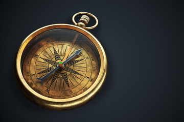Vintage brass compass isolated on black background 3d