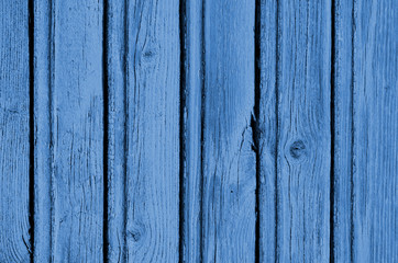 The blue wood texture with natural patterns. Classic Blue color. Color of the year 2020. Trendy color.