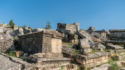 Fototapeta na wymiar Ruins of the ancient city of Hierapolis in Pamukkale, Denizli, Turkey