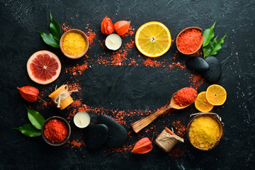 Obraz na płótnie Canvas Orange sea salt with aroma of orange. Spa treatments. Top view. Free copy space.