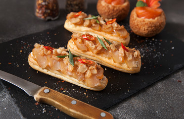 Gourmet salmon appetizer. Sandwich with salmon.