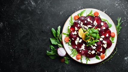 Beet vegetable salad with feta cheese. Food. Top view. Free space for your text.