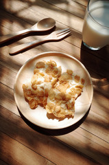 In Morning Homemade Cookies Cornflakes on Wooden Plate with Fresh Milk, Ready To Serve