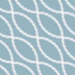 A seamless vector abstract geometric pattern with white embroidered chain on a blue background. Surface print design.