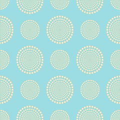 Glamour elegant seamless pattern with round yellow pearls composition on the light cyan background. Precious vector ornament for textile, wrapping paper, packet, poster, card, invitation