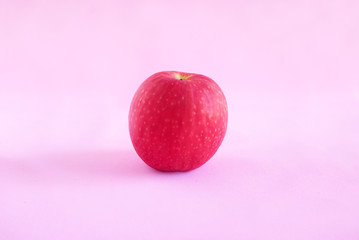apple on the pink background