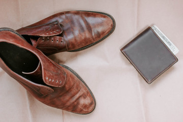 brown retro leather shoes and wallet.