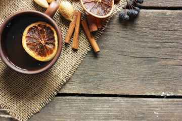 Christmas. cup of green tea with cinnamon, spices