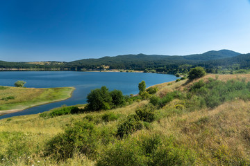 Fototapeta na wymiar Summer landscape along the road to Camigliatello, Sila. Cecita lake