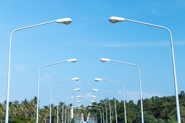 Lighting poles in both way of the bridge so many put on pattern in day time