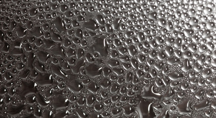 Drops of water on glass as a background