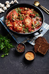 Chicken Cacciatore in a black dutch oven