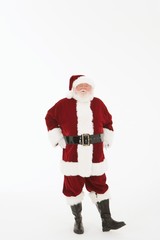 Senior Santa Claus Standing With Hands On Hip