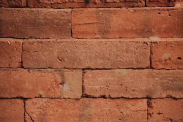 Old grunge red brick wall background texture