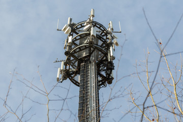 GAUTING, BAVARIA / GERMANY - December 11, 2019: Close-up view on the top of a telecommunications...