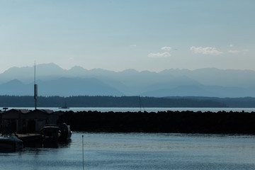 Shilshole Bay Marina, in Ballard Washington, with Puget Sound and Olympic mountains in background