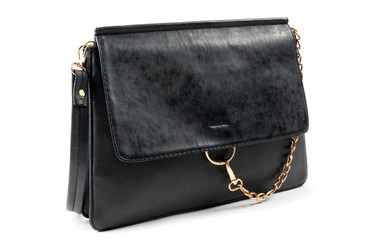 Elegant female fashion bag on the white