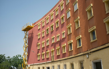 Painter working over telescopic boom