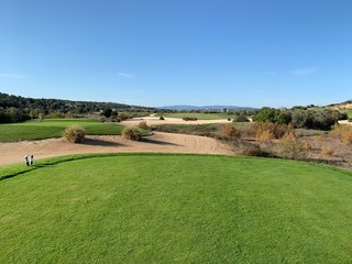 Obraz premium golf tee boxes with sand and clear blue sky