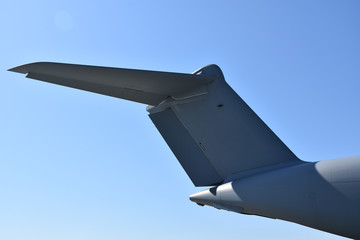 Fototapeta na wymiar Airplane tail with sky background