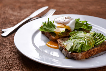 toasta with avocado and egg