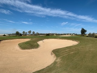 white sand bunker on golf course