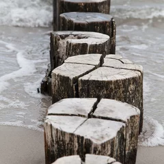 Foto auf Leinwand Nordsee Vintage und nasser Steg im Norden sehen mit Wellen  © zabanski