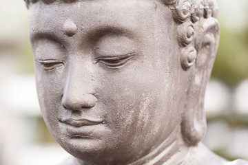 close up of a stone buddha portraits