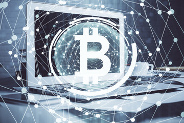 Multi exposure of blockchain theme hologram and table with computer background. Concept of bitcoin...