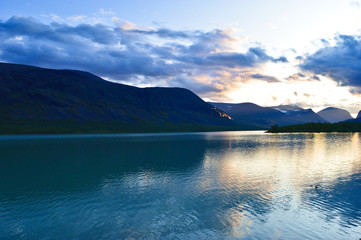 Big clouds over the biggest swedish mountains, kebnekaise valley in Sweden near Nikkaluokta