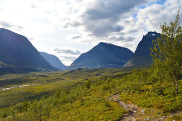 Hiking and backpacking in the valley of the highest Swedish mountains. Nikkaluoakta and Kebnekaise valley
