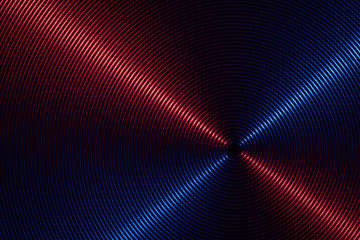 A close up macro photo of circular brushed steel metal texture with crossed red and blue lines