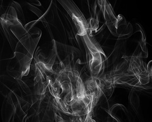 A close up macro photo of incense smoke in black and white to create a moody glow overlay