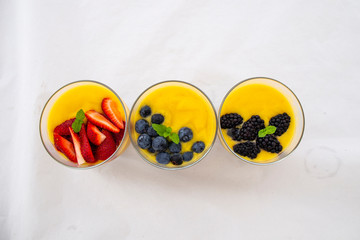 Chia pudding and Mango smoothie with fruit topping