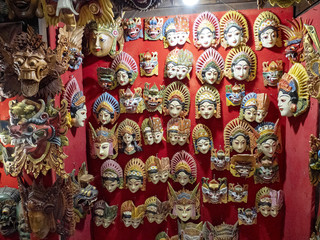 Souvenir on the wall in shop. Ubud, Bali, Indonesia.