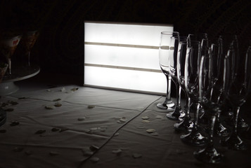 Black and white light box next to glasses