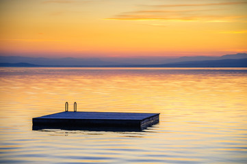 Naklejka premium Lake Neusiedl in Burgenland with stunning sunset