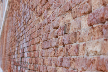 Closeup View of Worn Red Brick Walls in Venice
