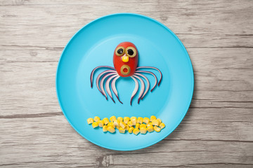 Jellyfish made with vegetables on blue plate