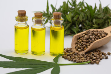  CBD hemp oil, Hemp oil extract in glass bottles, medical marijuana concept.