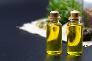 cannabis CBD oil hemp products, cannabis oil extracts in jars,  patient medical marijuana and oil.  alternative remedy or medication, medicine concept