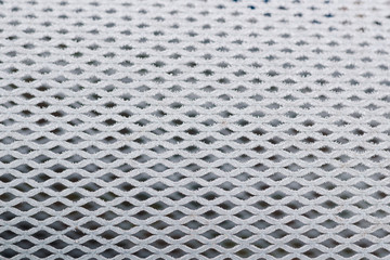 Fine mesh covered with white hoarfrost, background, texture, selective focus