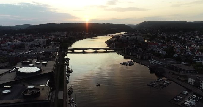 Aerial view of paceful sunset over beautiful river and city. (Kristiansand, Norway) 