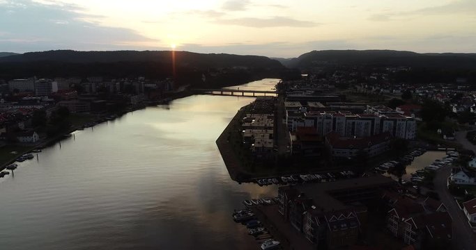 Aerial view of paceful sunset over beautiful river and city. (Kristiansand, Norway) 